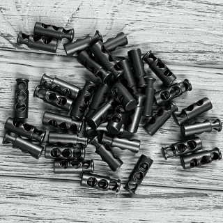 Металевий фіксатор шнурків чорного кольору фото