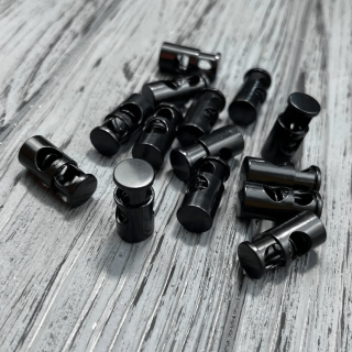 Чорний фіксатор шнура фото